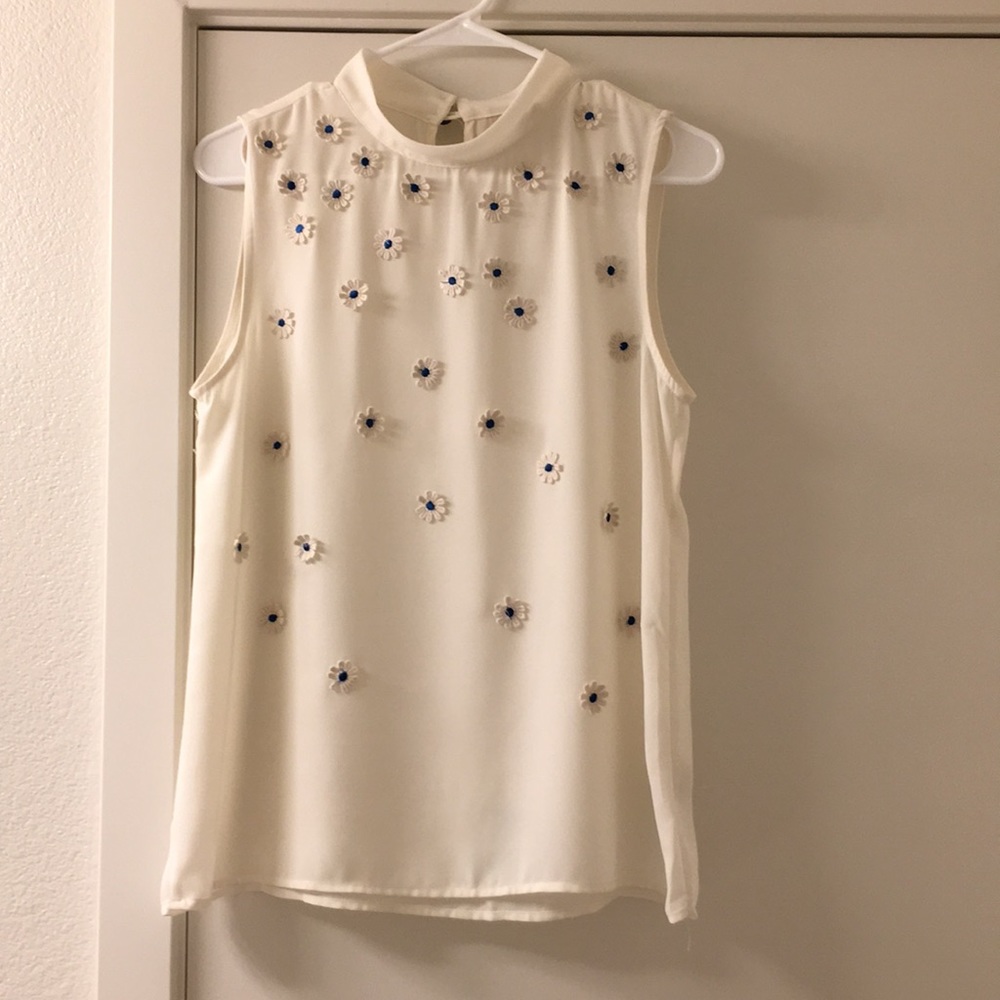 White Sleeveless Blouse with Adoring Flowers